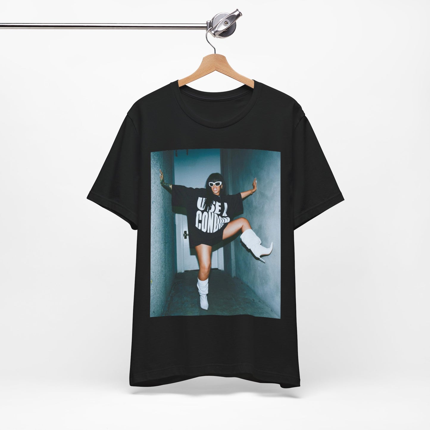 A black graphic t-shirt featuring a modern pop essential graphic of Rihanna.