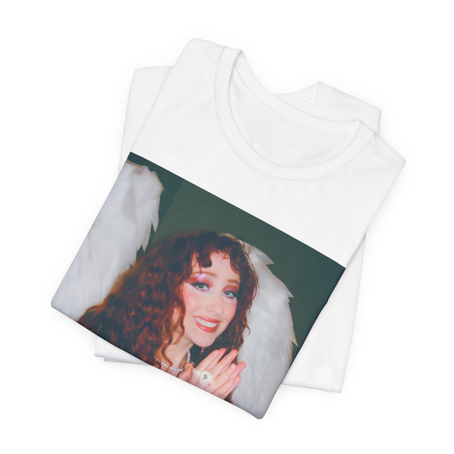 A black graphic t-shirt featuring a graphic of Chappell Roan, possibly with DIY or independent pop elements.