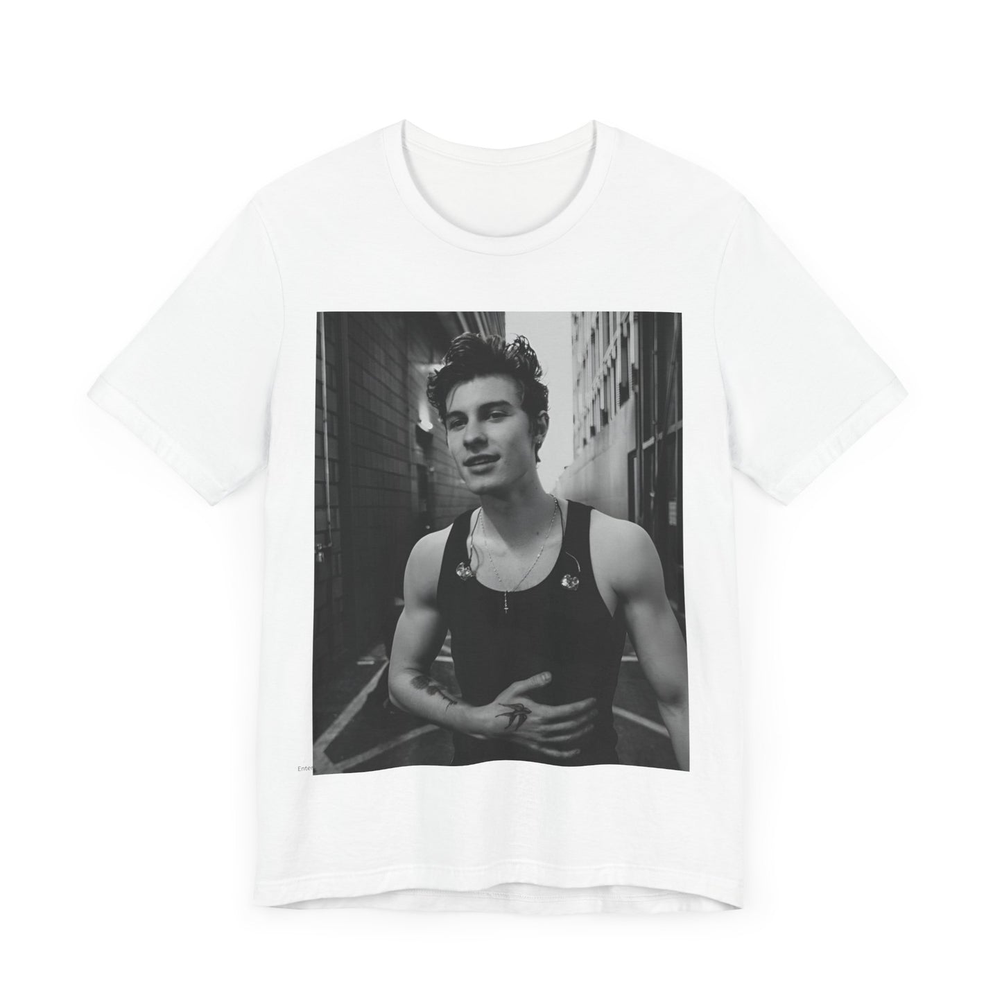 A black graphic t-shirt featuring a vintage black and white portrait graphic or photo of Shawn Mendes.
