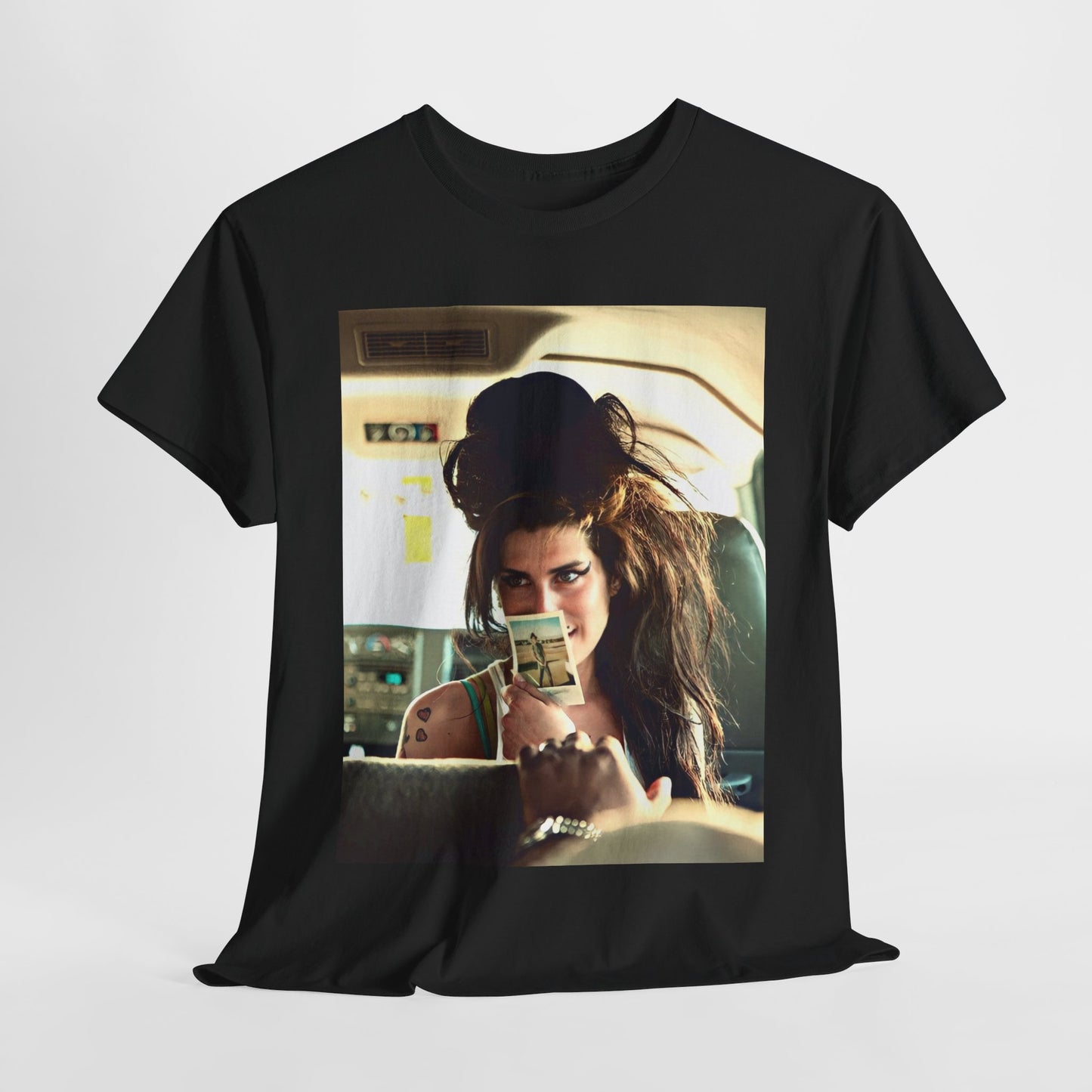 A black graphic t-shirt featuring a chaotic or candid graphic of Amy Winehouse offstage, capturing her intense or expressive moments.