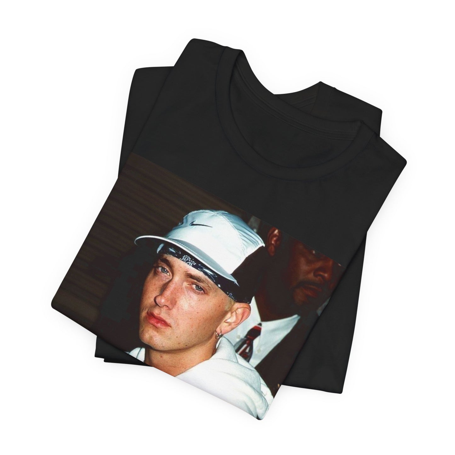 A black graphic t-shirt featuring a retro graphic or photo of Eminem in a backstage setting.