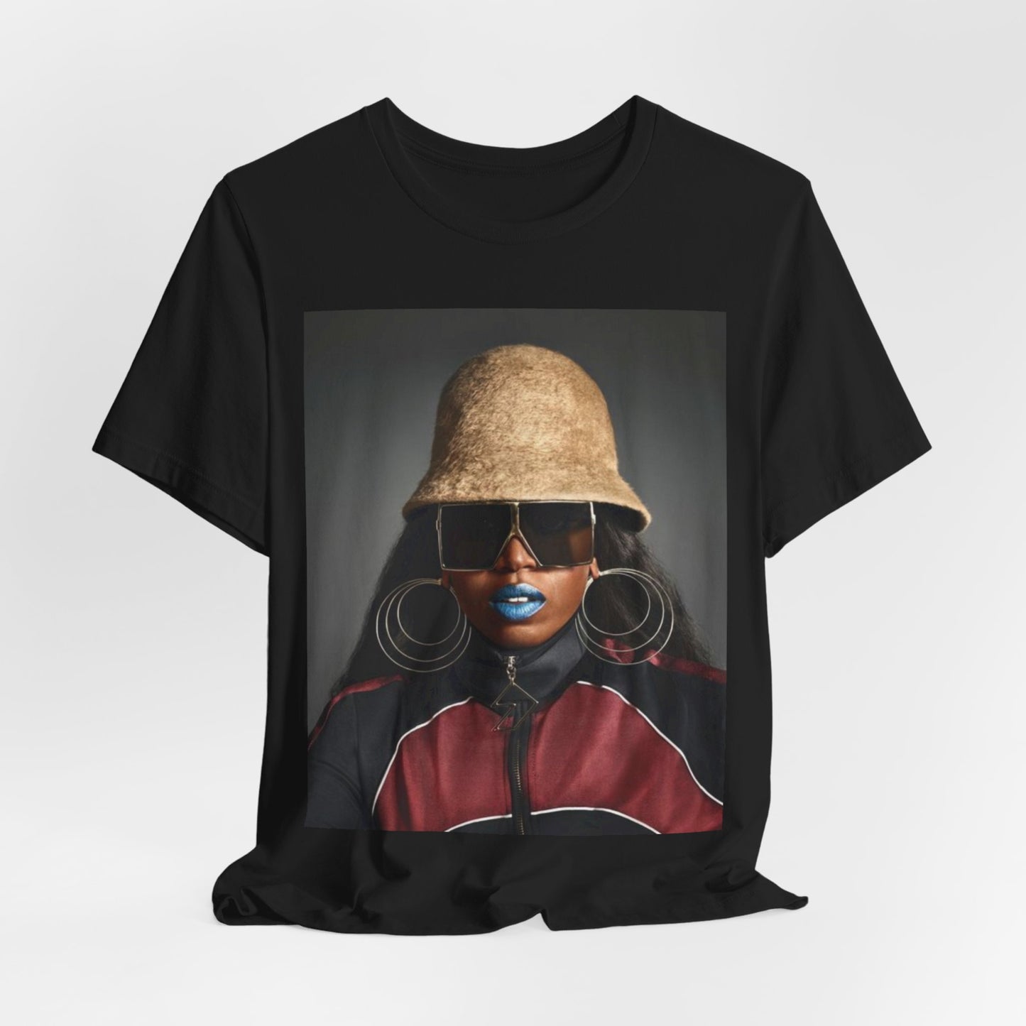A black graphic t-shirt featuring a vintage hip hop icon graphic of Missy Elliott.