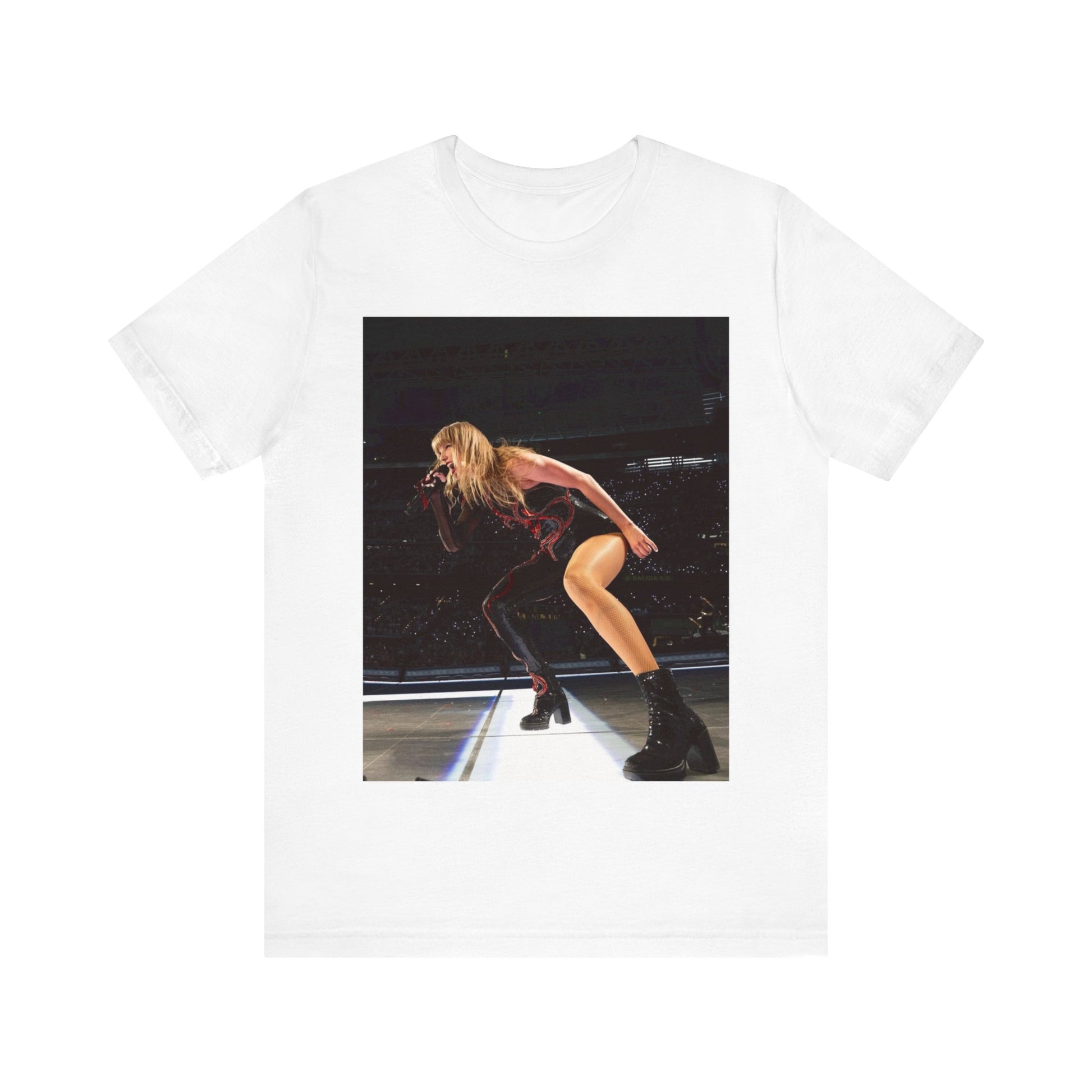 A black graphic t-shirt featuring a fierce graphic of Taylor Swift on stage.