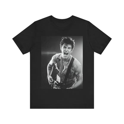 A black graphic t-shirt featuring a black and white photo of Shawn Mendes, emphasizing his charm.