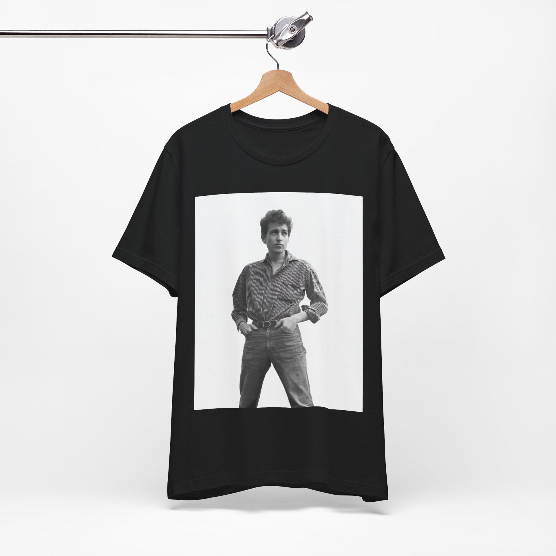 A black graphic t-shirt featuring a vintage 60s folk aesthetic graphic of Bob Dylan.