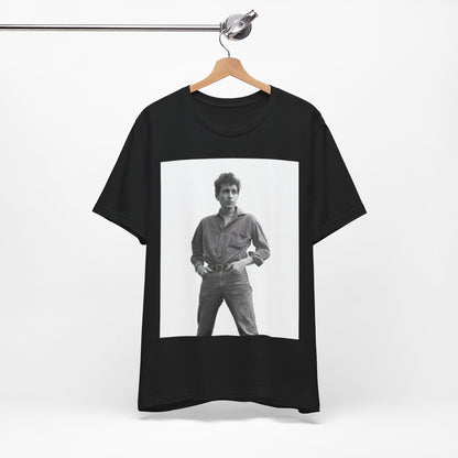 A black graphic t-shirt featuring a vintage 60s folk aesthetic graphic of Bob Dylan.