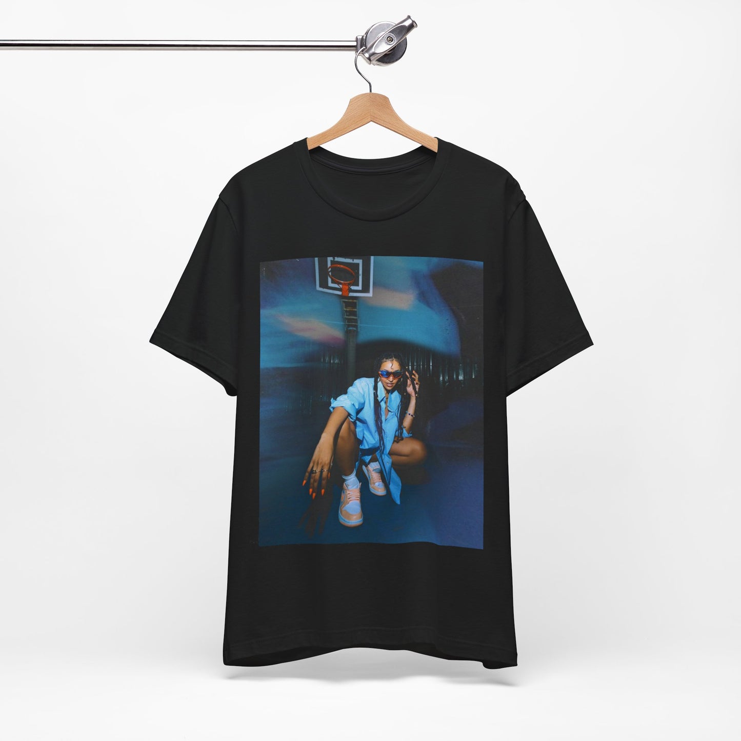 A black graphic t-shirt featuring an indie R&B streetwear graphic of Tinashe.