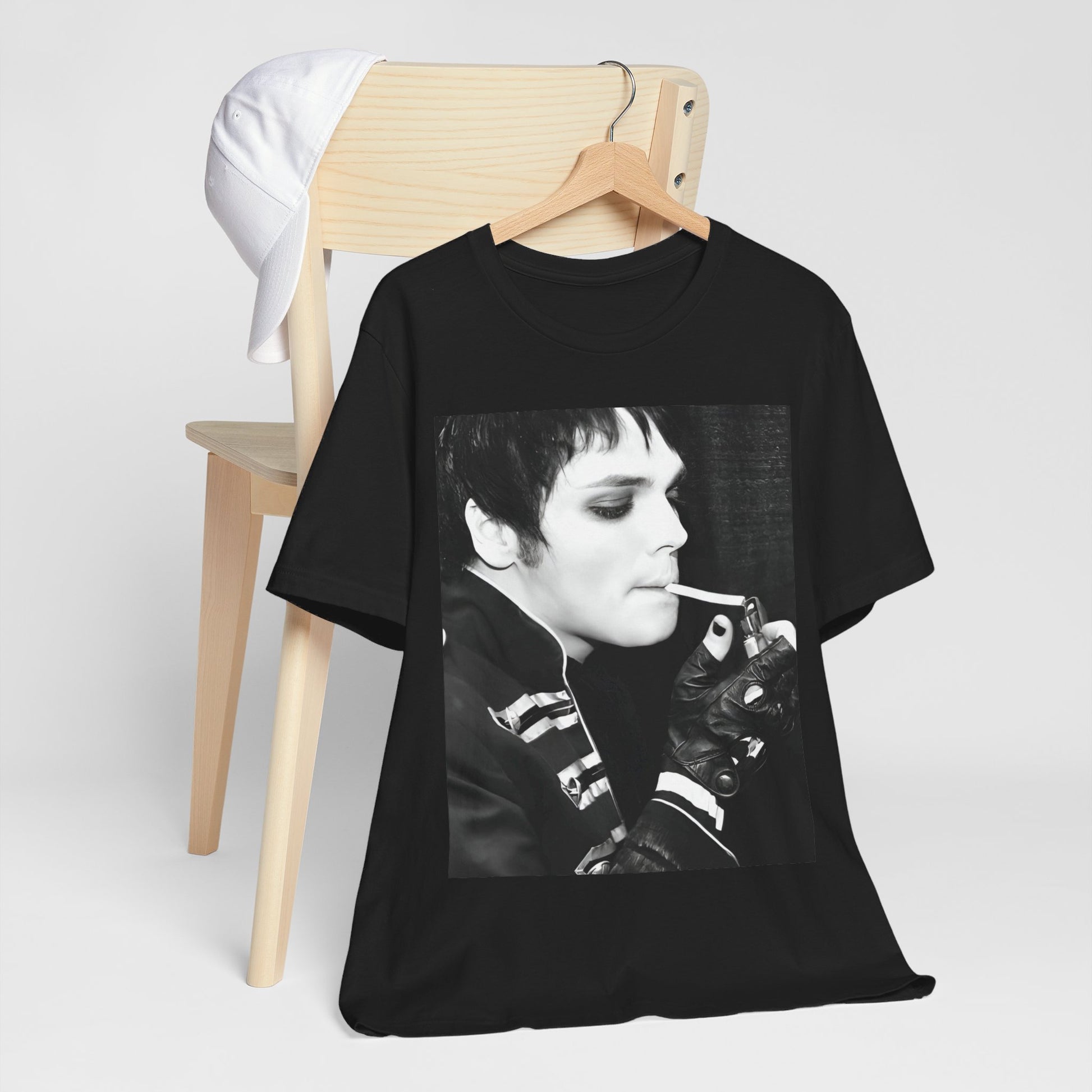 A black graphic t-shirt featuring a black and white graphic or photo of My Chemical Romance in a backstage setting.