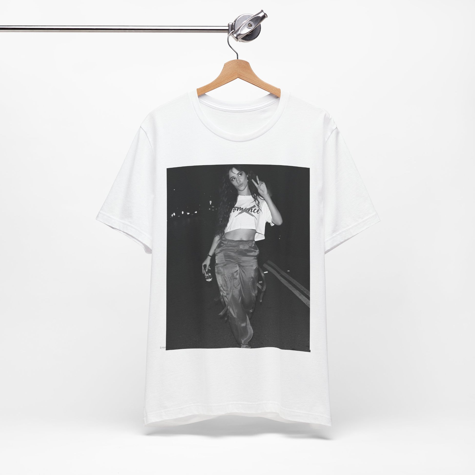 A black graphic t-shirt featuring a photo of Camila Cabello from her "Romance" album era.