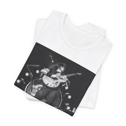A black graphic t-shirt featuring a vintage photo of Foo Fighters performing live.