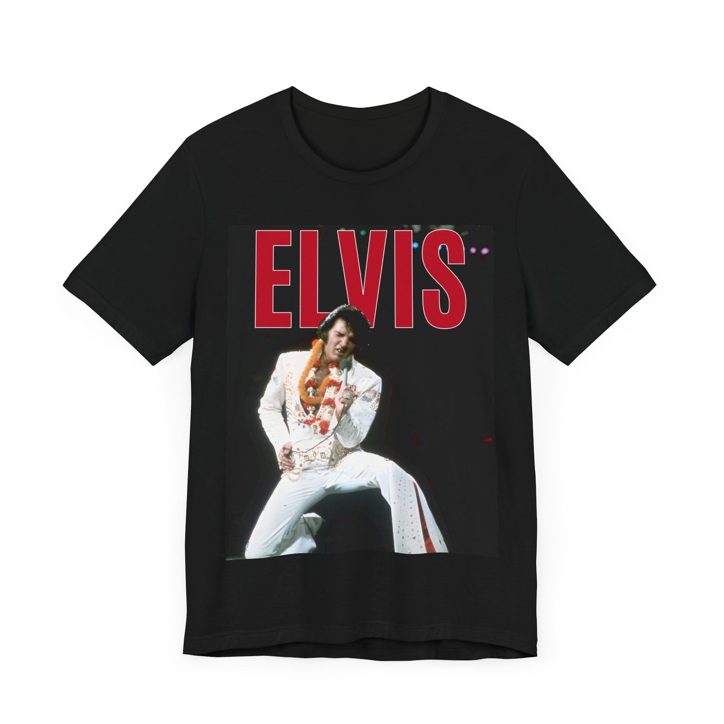 A black graphic t-shirt featuring a glamorous graphic or photo of Elvis Presley on a Las Vegas stage.