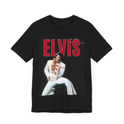 A black graphic t-shirt featuring a glamorous graphic or photo of Elvis Presley on a Las Vegas stage.