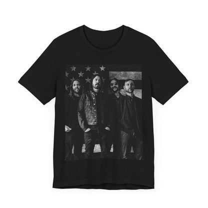 A black graphic t-shirt featuring a graphic of Foo Fighters integrated with elements of the American flag.