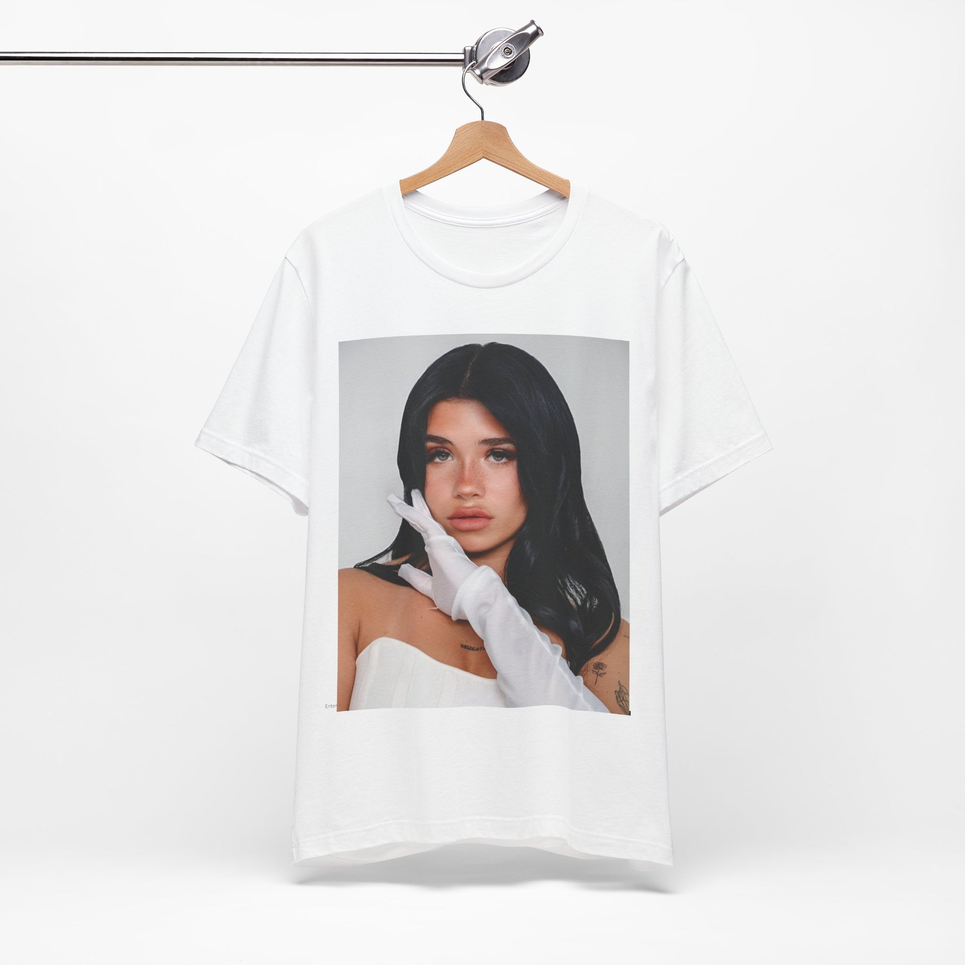 A black graphic t-shirt featuring a portrait graphic of Nessa Barrett.
