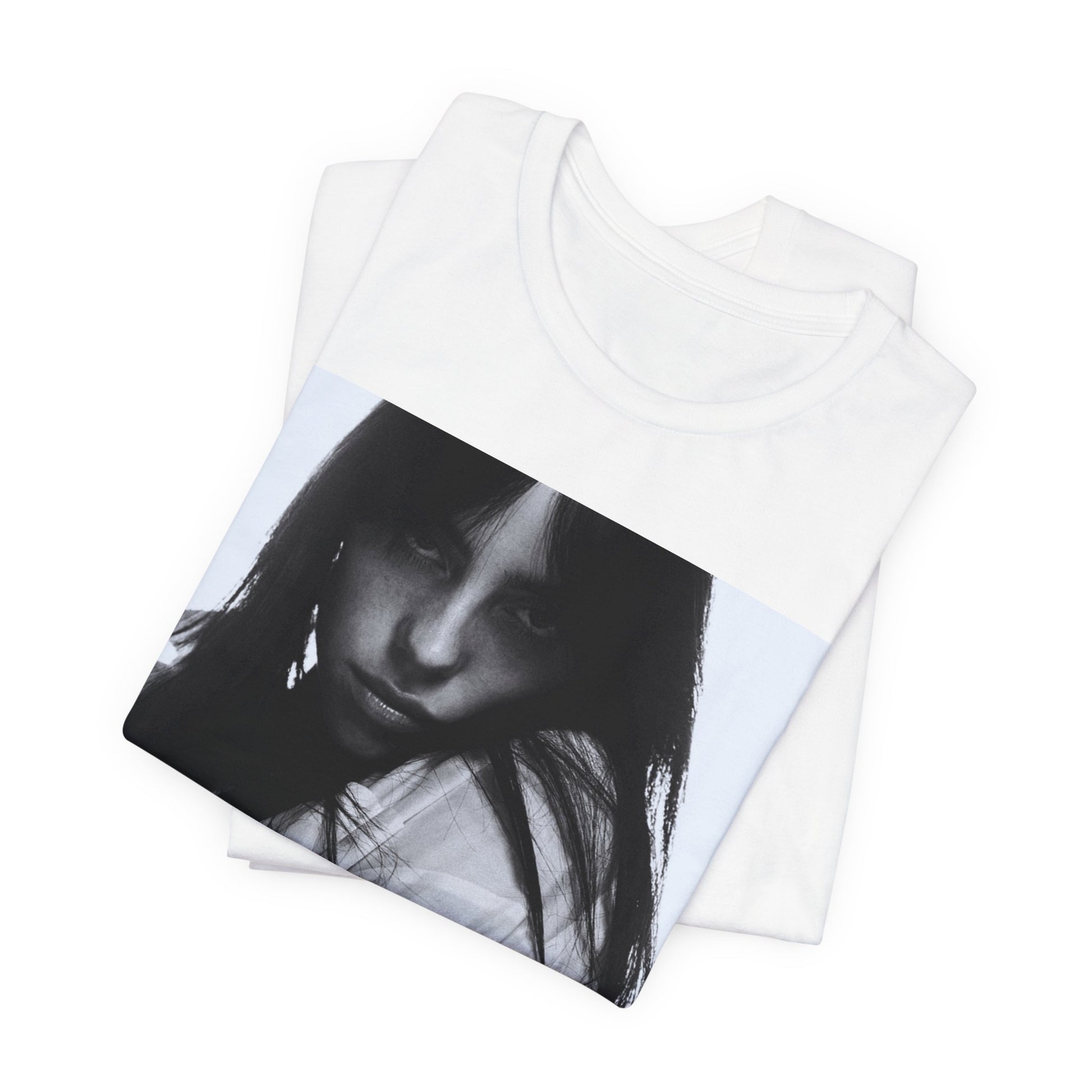 Billie Eilish posing in her signature oversized designer streetwear, printed on a graphic t-shirt.