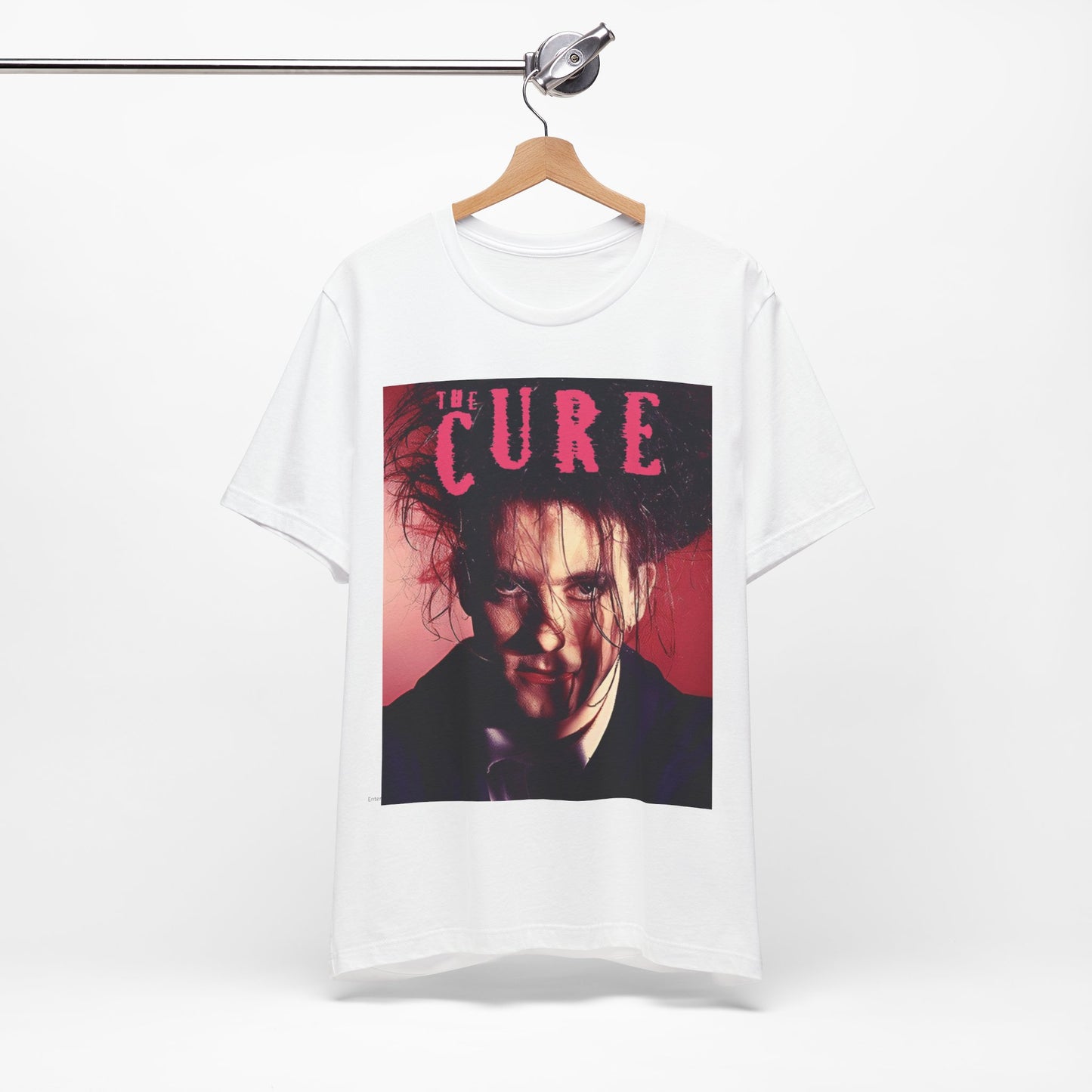 A black graphic t-shirt featuring a vintage graphic related to The Cure's 'Just Like Heaven' song or era.