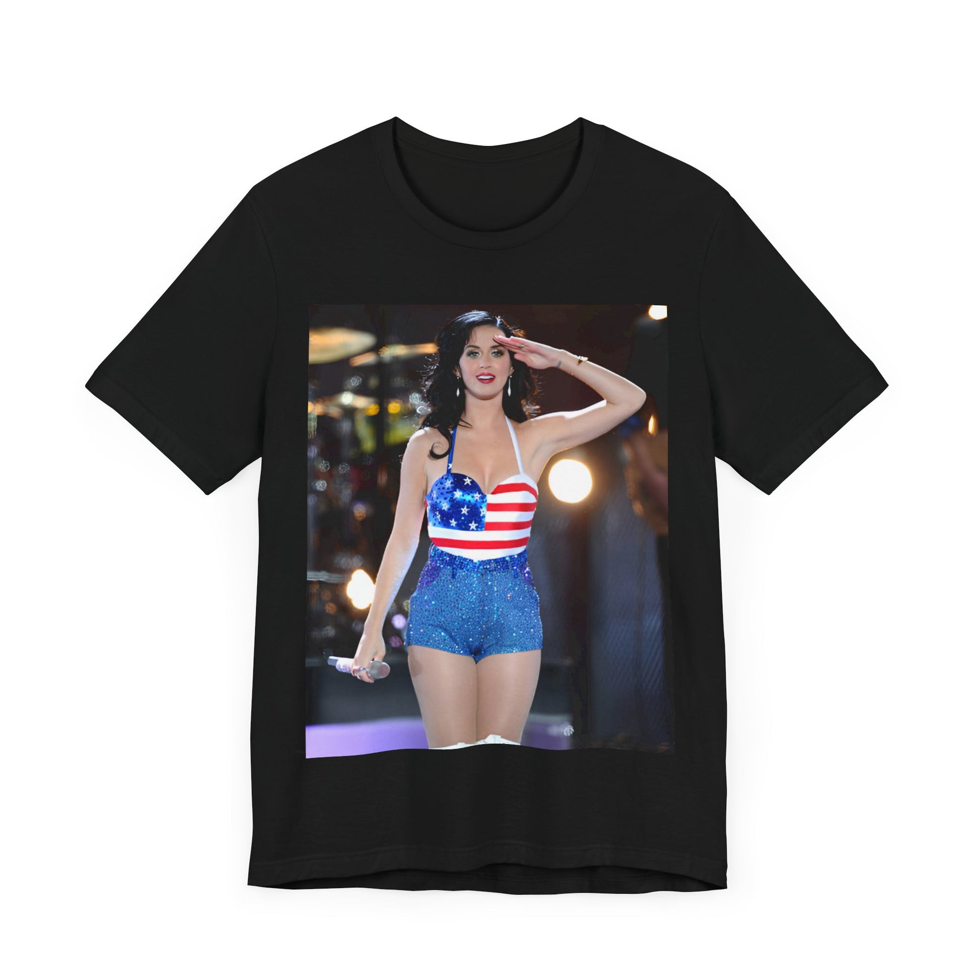 A black graphic t-shirt featuring a vintage graphic related to Katy Perry's 'Firework' song or era.