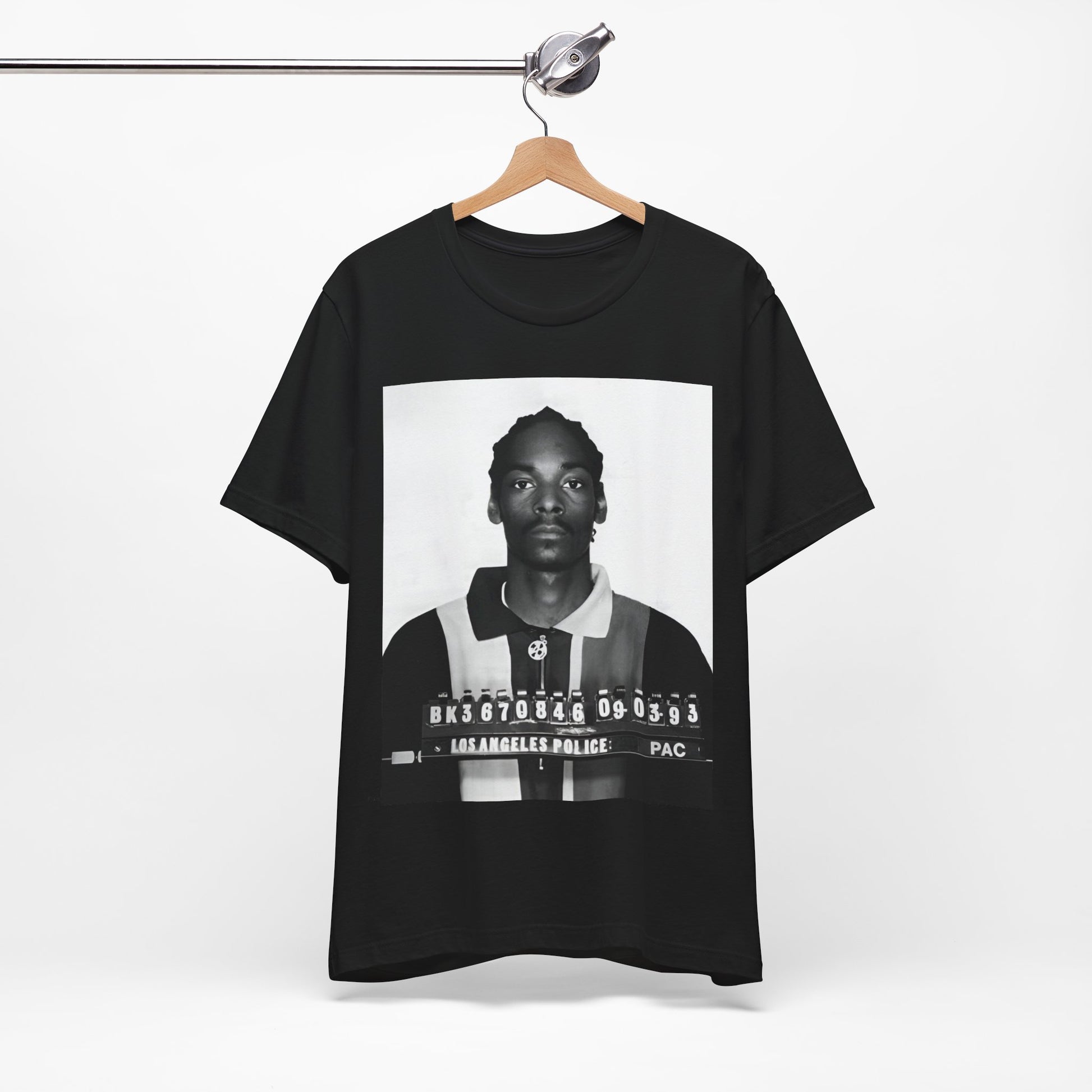 A black graphic t-shirt featuring a graphic of Snoop Dogg's mug shot.