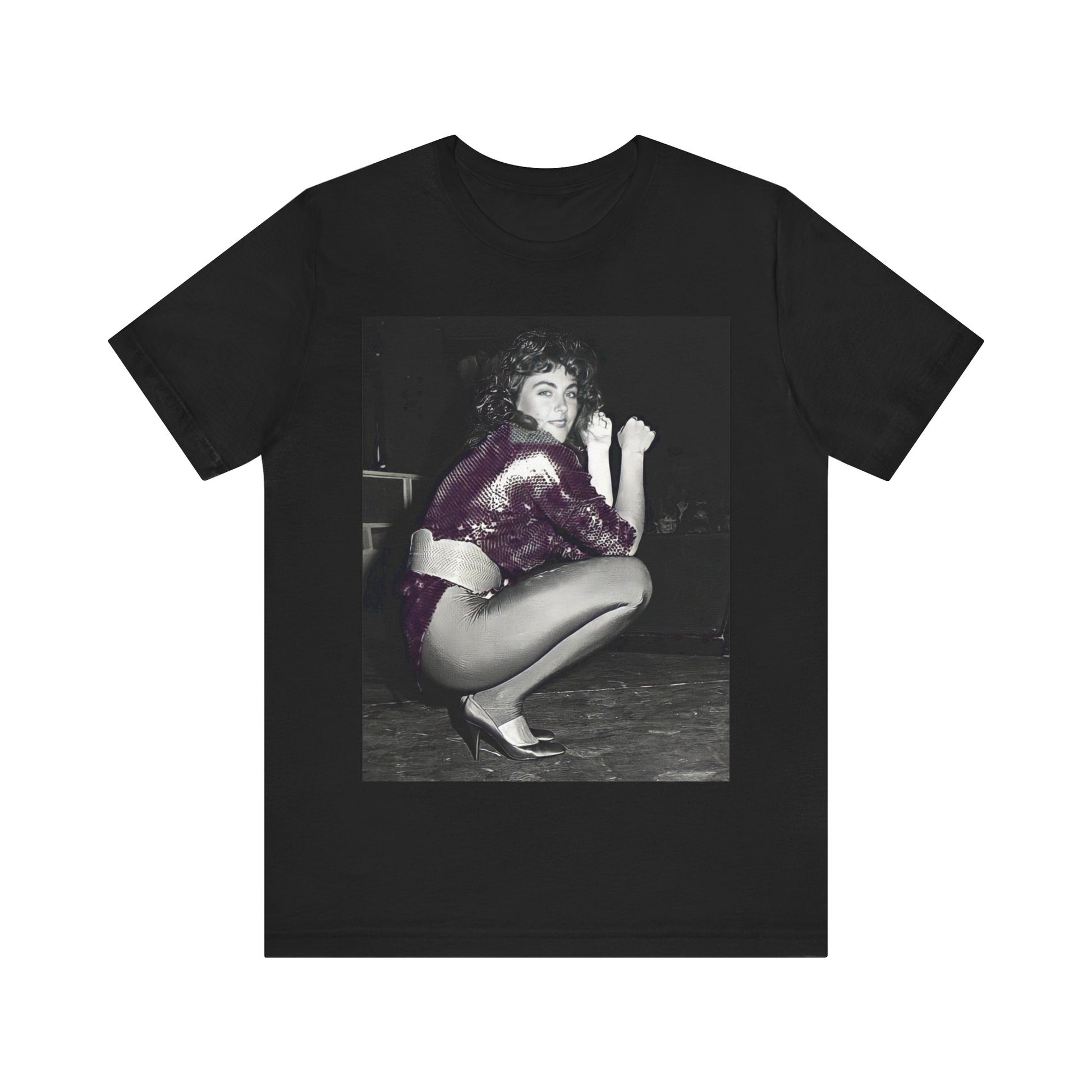 A black graphic t-shirt featuring a graphic of Laura Branigan as an 80s disco pop queen.