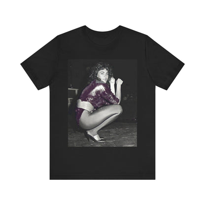 A black graphic t-shirt featuring a graphic of Laura Branigan as an 80s disco pop queen.