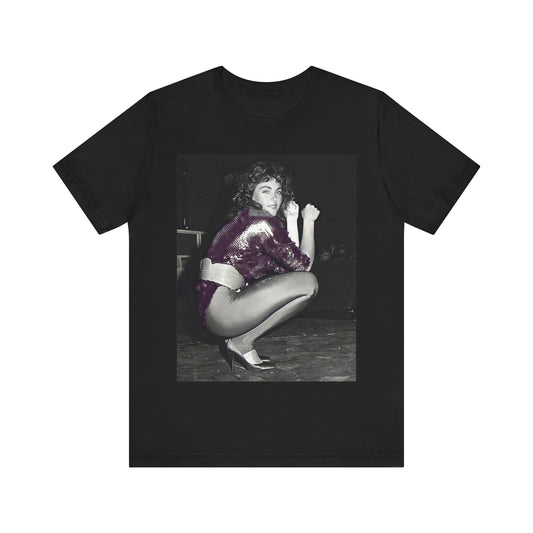 A black graphic t-shirt featuring a graphic of Laura Branigan as an 80s disco pop queen.