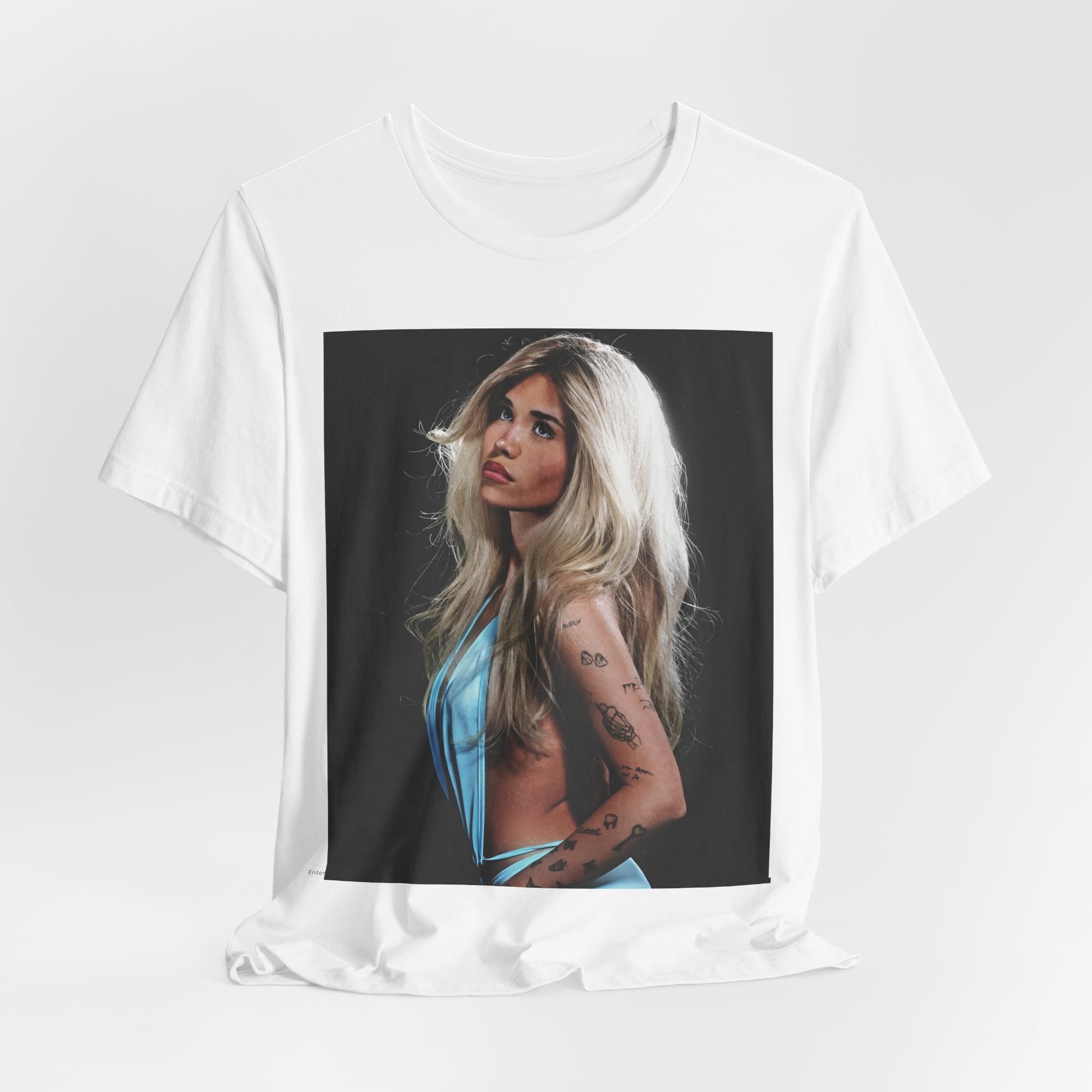 A black graphic t-shirt featuring a graphic related to Nessa Barrett's 'Pain' song or era.