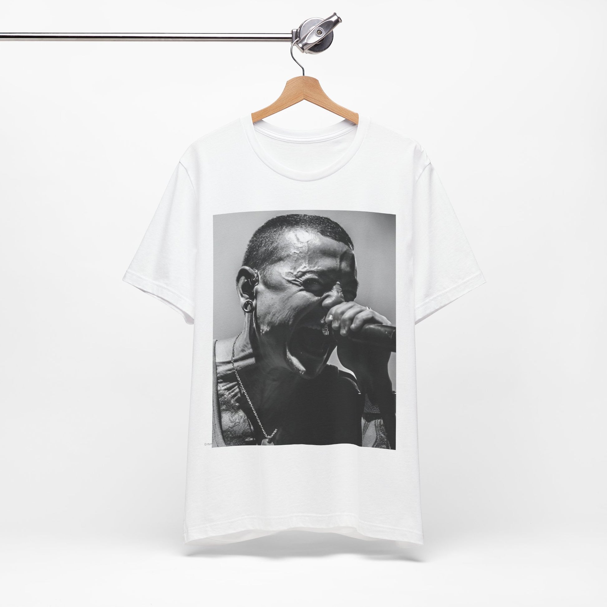 A black graphic t-shirt featuring a fierce graphic of Linkin Park performing live on stage.
