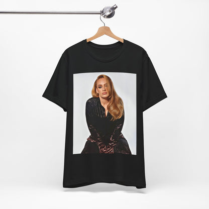 A black graphic t-shirt featuring a portrait of Adele from her iconic blonde era, with her hair styled and her expression poised and elegant.