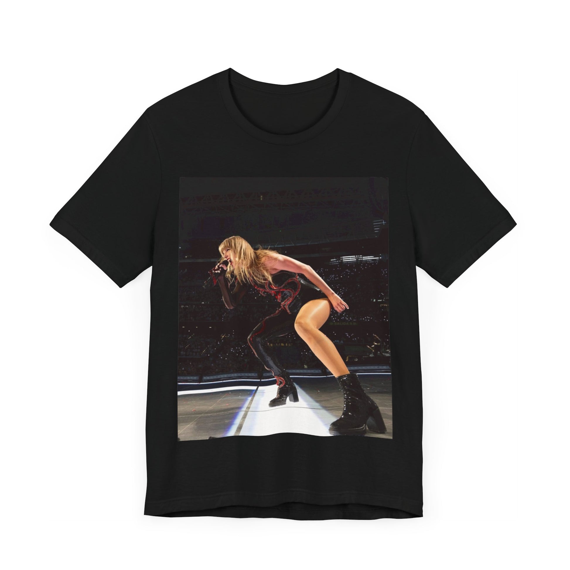 A black graphic t-shirt featuring a fierce graphic of Taylor Swift on stage.