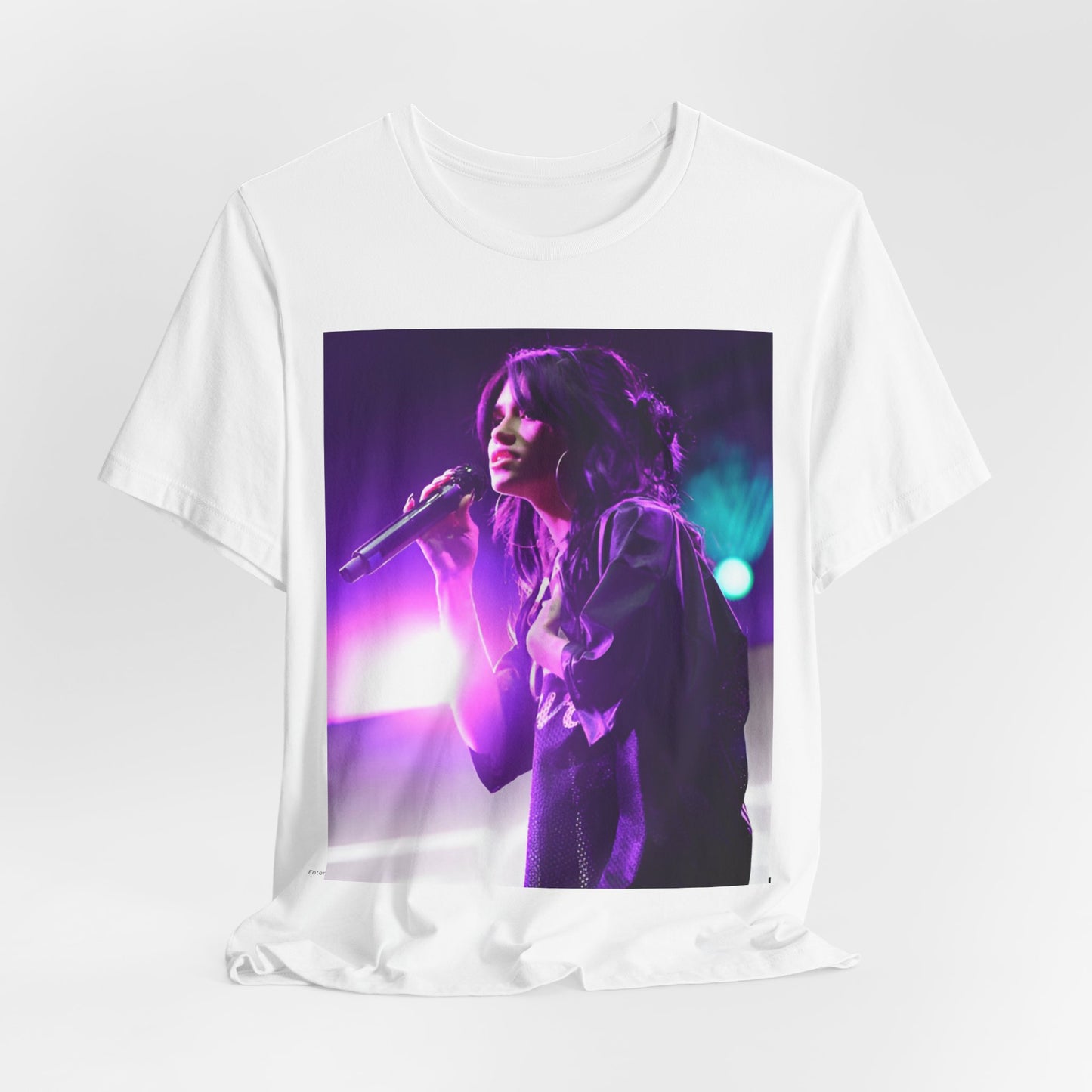 A black graphic t-shirt featuring a graphic or photo of Nessa Barrett performing live on stage.