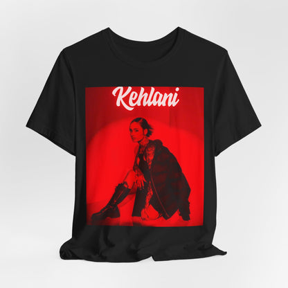 A black graphic t-shirt featuring a photo of Kehlani with a prominent red aesthetic or red lighting.
