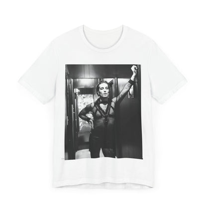 A black graphic t-shirt featuring a graphic of Maneskin emphasizing a rebel rock spirit.