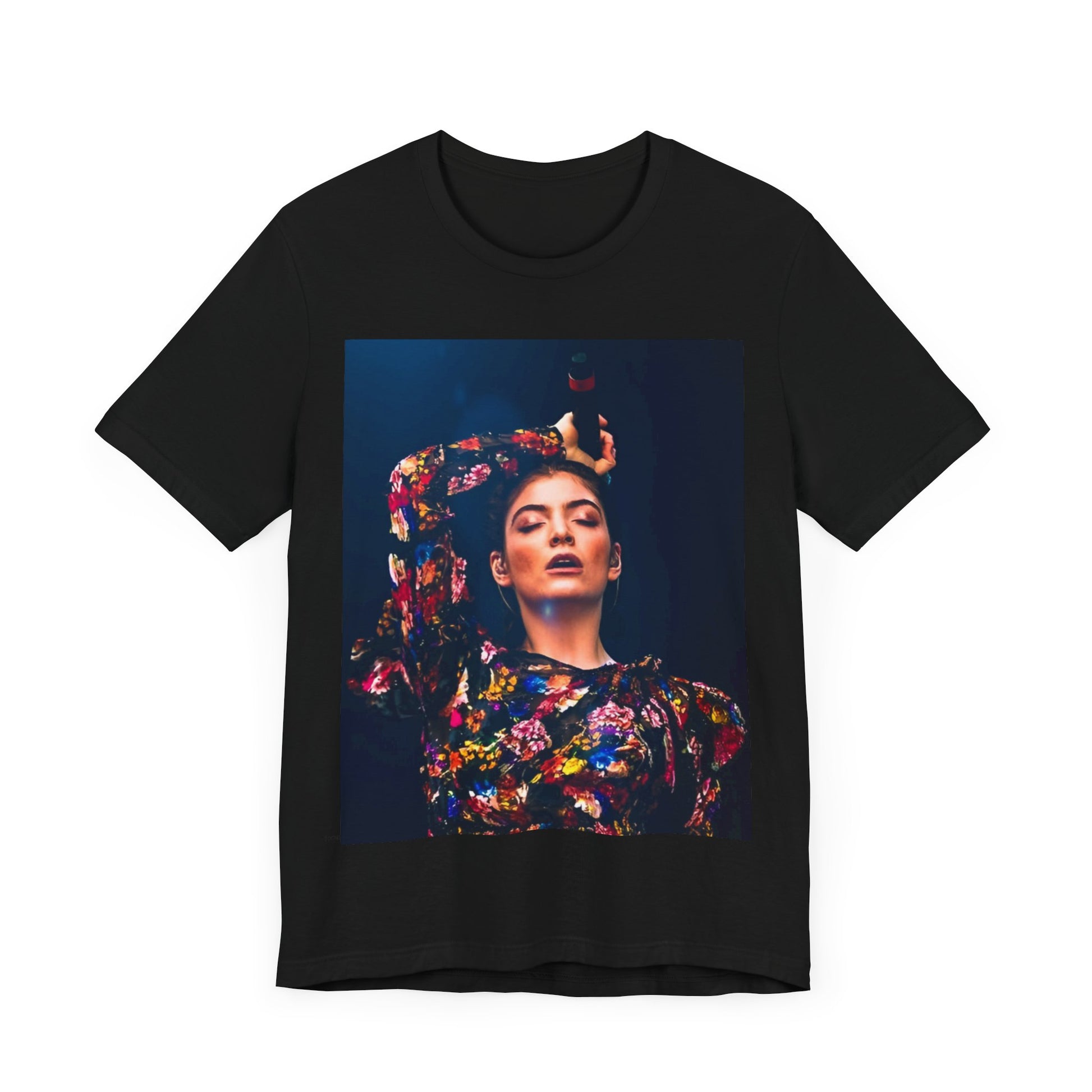 A black graphic t-shirt featuring a retro graphic related to Lorde's 'Pure Heroine' album era.