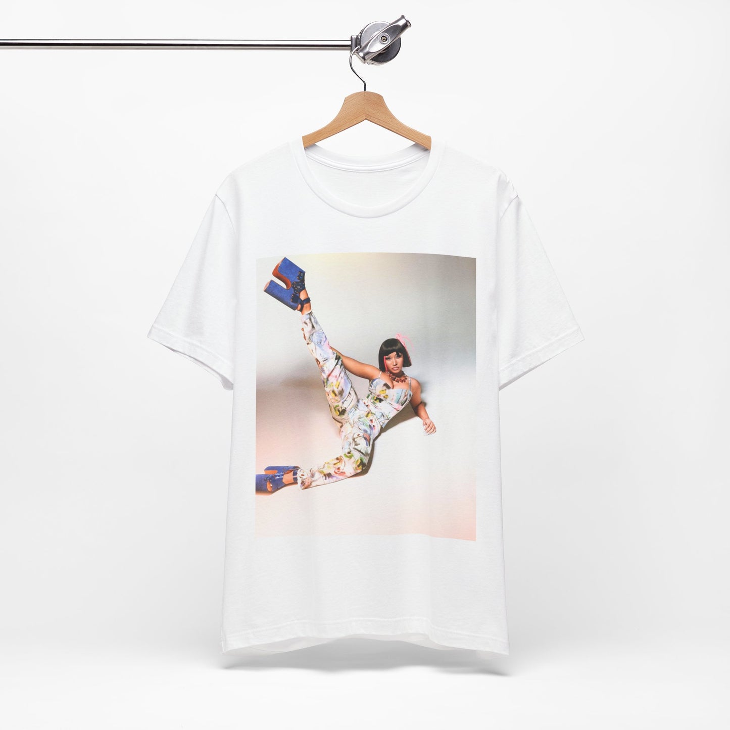 A black graphic t-shirt featuring a graphic of Nicki Minaj as a global fashion rap queen.