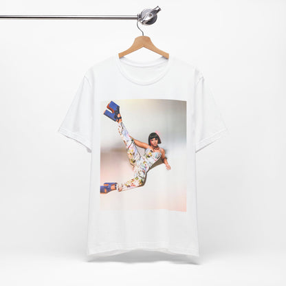 A black graphic t-shirt featuring a graphic of Nicki Minaj as a global fashion rap queen.