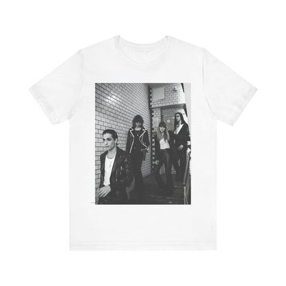 A black graphic t-shirt featuring a black and white graphic or photo of Maneskin in a backstage setting.