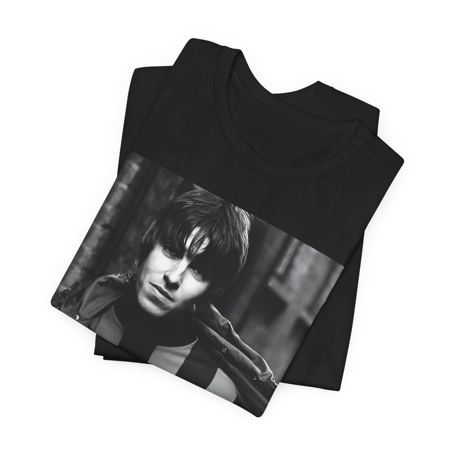 A black graphic t-shirt featuring a photo of Liam Gallagher from Oasis, showing his support for Manchester City.
