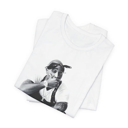 A black graphic t-shirt featuring a graphic of Tupac with a conscious rap vibe.