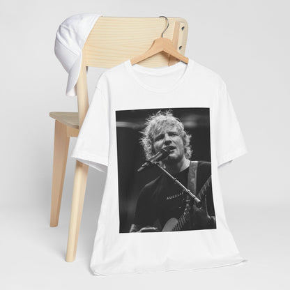 A black graphic t-shirt featuring a black and white photo of Ed Sheeran performing live.