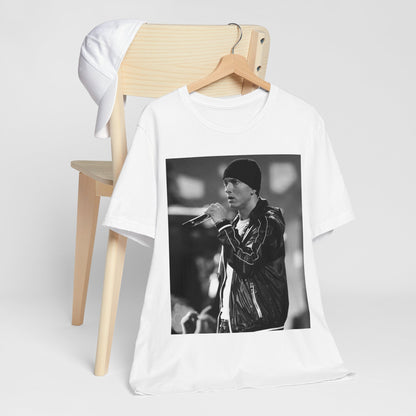 A black graphic t-shirt featuring a classic 90s graphic of Eminem as a 'Rap God'.