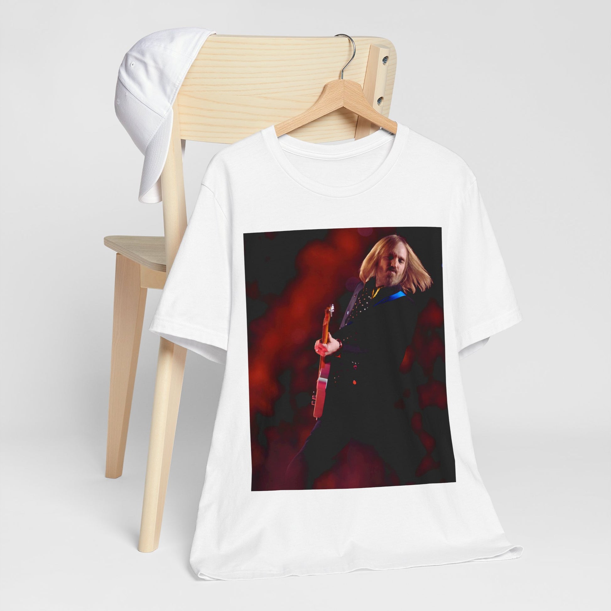 A black graphic t-shirt featuring a graphic or photo of Tom Petty as a powerhouse live performer.