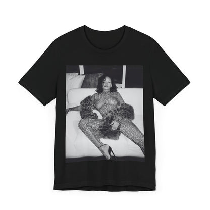 A black graphic t-shirt featuring a black and white, monochrome graphic or photo of Rihanna in a sexy pose.