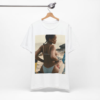 A black graphic t-shirt featuring a graphic of Rihanna as a bikini babe in paradise.