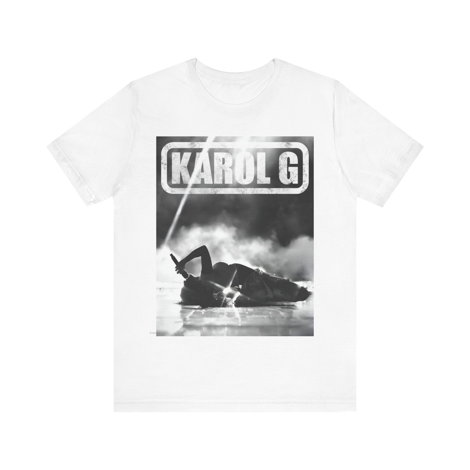 A black graphic t-shirt featuring a black and white graphic or photo of Karol G performing live on stage.