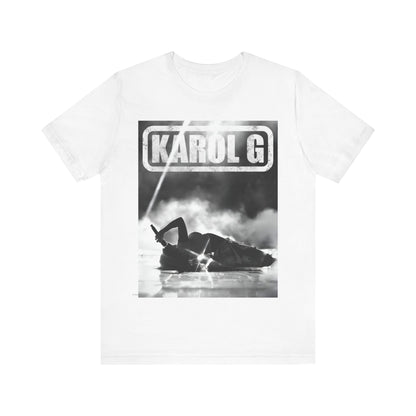 A black graphic t-shirt featuring a black and white graphic or photo of Karol G performing live on stage.