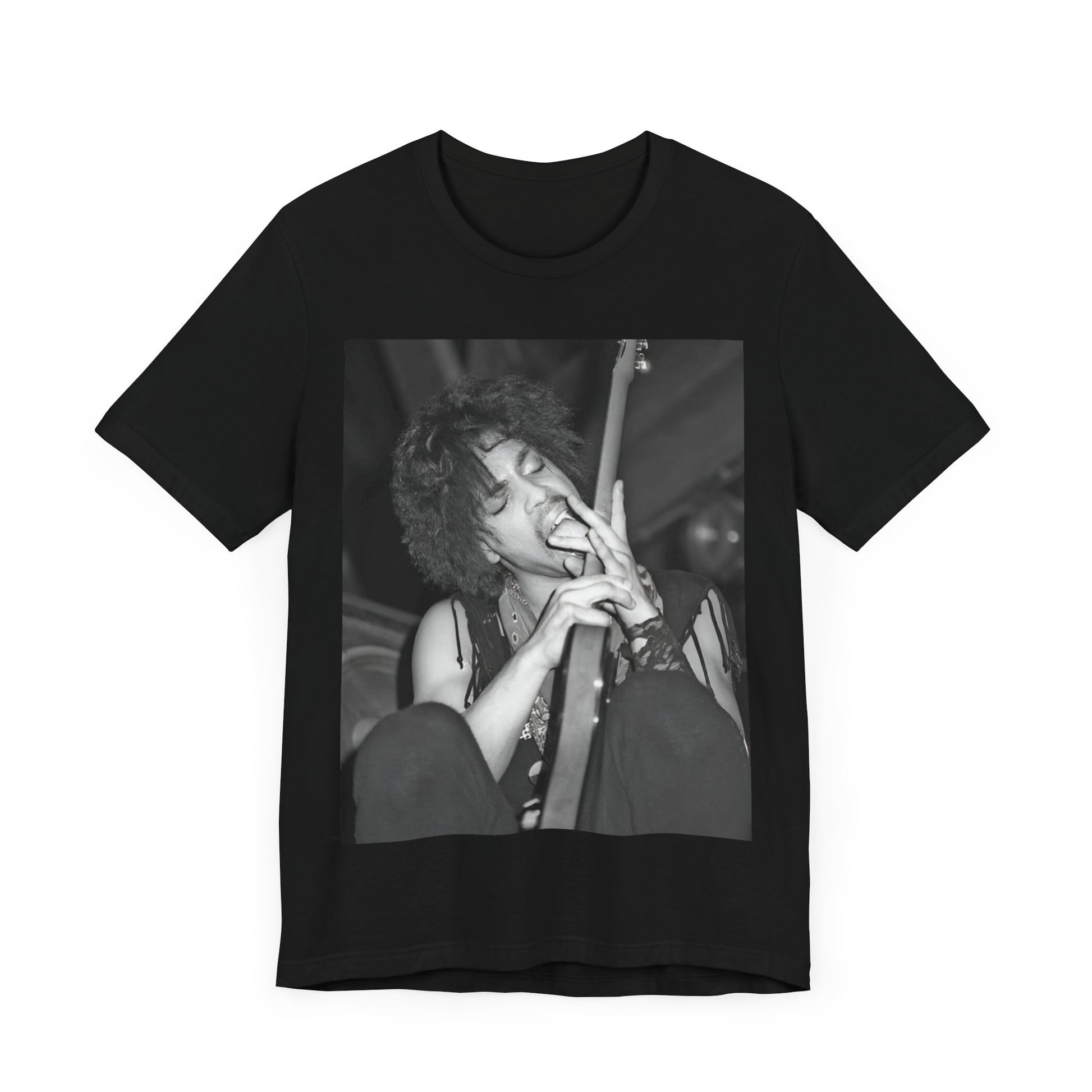 A black graphic t-shirt featuring a graphic or photo of Prince performing wildly on stage.