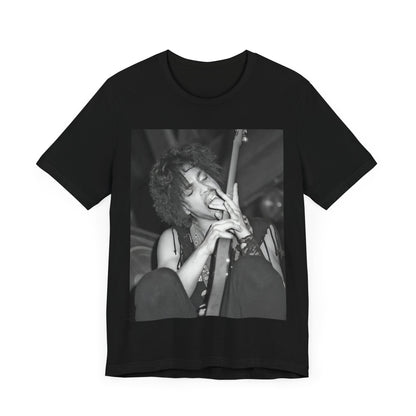 A black graphic t-shirt featuring a graphic or photo of Prince performing wildly on stage.