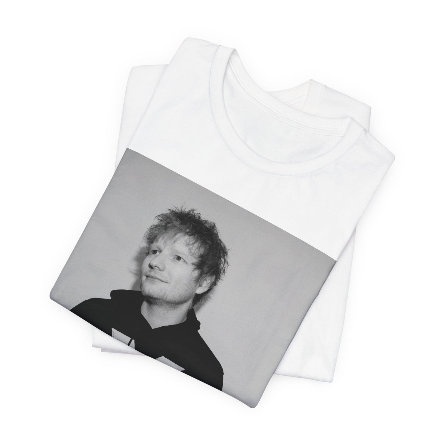 A black graphic t-shirt featuring a black and white graphic related to Ed Sheeran's album 'X'.