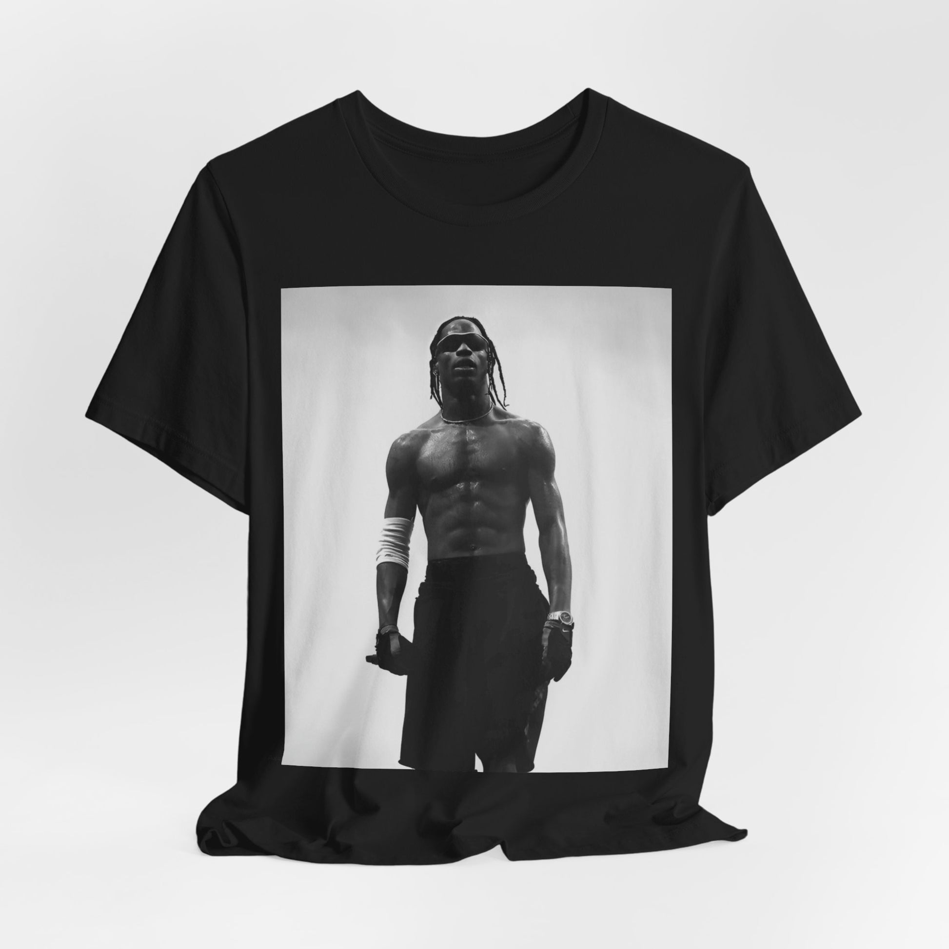 A black graphic t-shirt featuring a black and white portrait photo of Travis Scott.