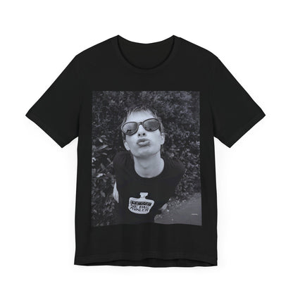 A black graphic t-shirt featuring a retro 90s graphic of Thom Yorke from Radiohead.